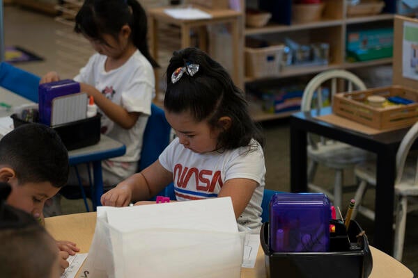 children working at desk